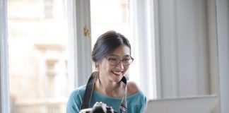 Cheerful Woman with Camera