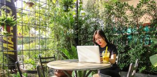 Woman Working on Laptop Outdoors