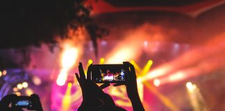 Person Taking Photo at Concert