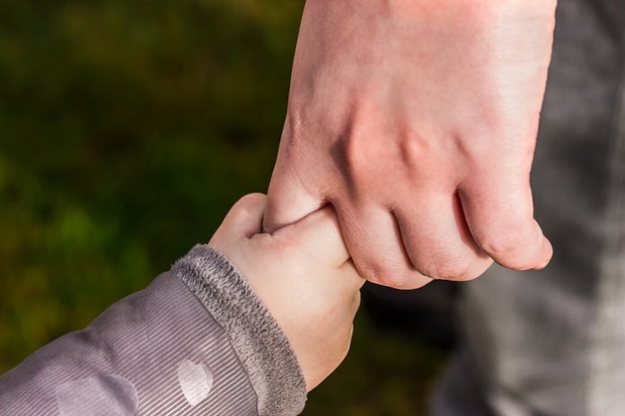 Baby and Parent Hands