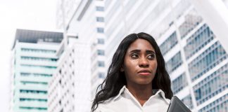 Businesswoman Holding a Laptop