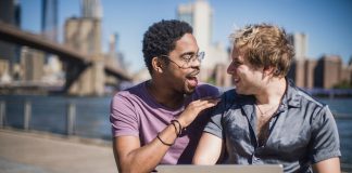 Men Smiling at Each Other