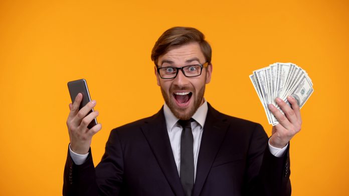 Man Making Money from Phone App