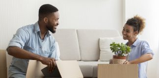 Couple Packing Boxes at Home