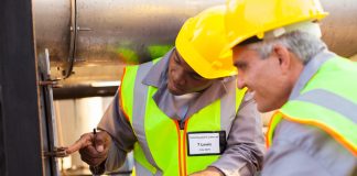 Engineers Inspecting Pipeline