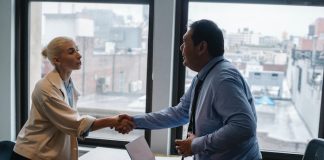 Woman and Man Shaking Hands