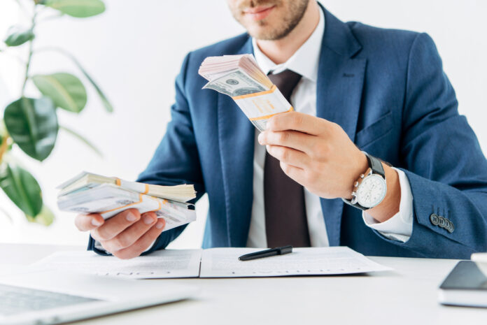 Man Holding Money