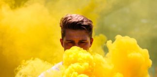 Man with Yellow Smoke