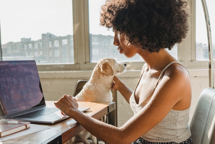 Woman Working from Home with Dog