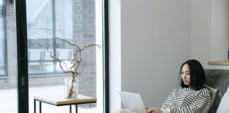 Woman with laptop at home