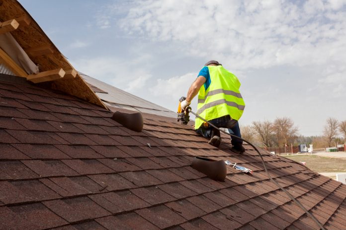 Worker on roof