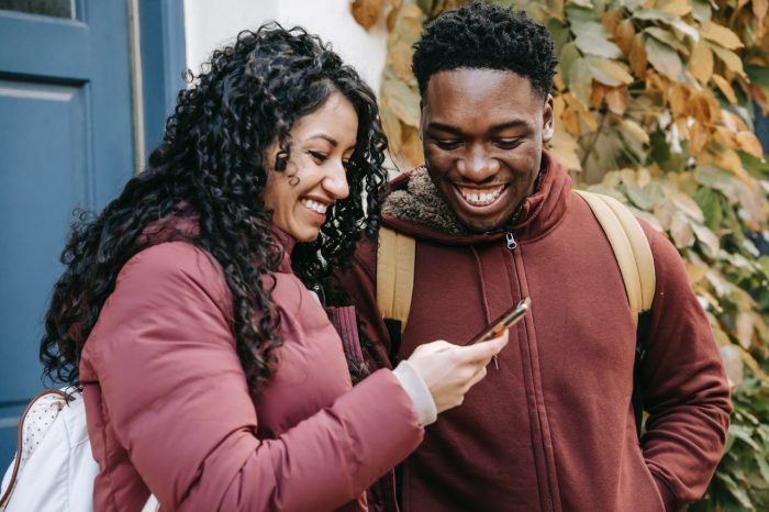 People Looking at Video on Phone