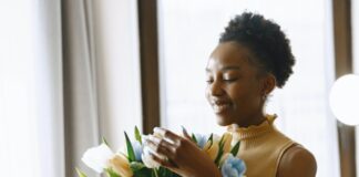 Person holding flowers