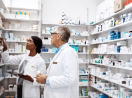 Pharmacists looking at healthcare labels