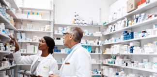 Pharmacists looking at healthcare labels