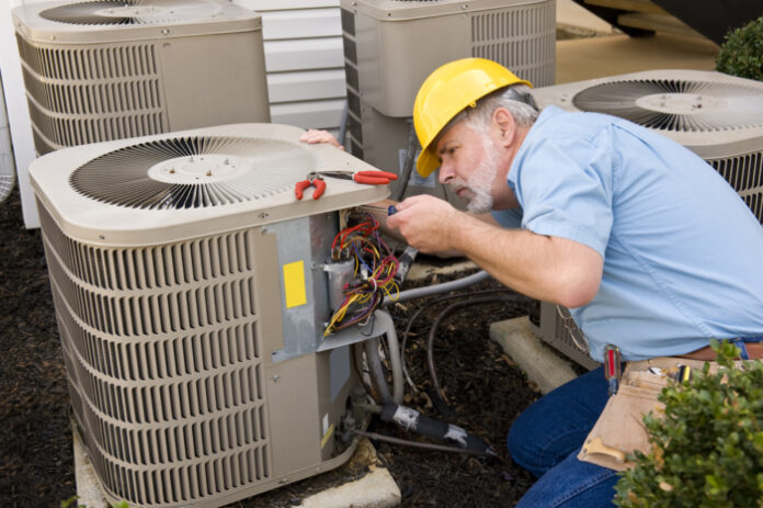 Specialist Repairing HVAC System