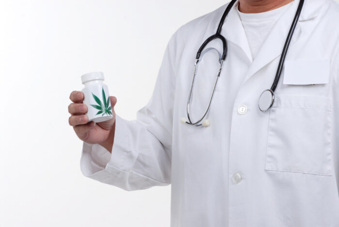 Doctor prescribing an MMJ card