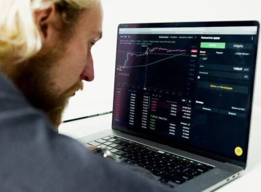 Business Person Assessing Stock Market Trading