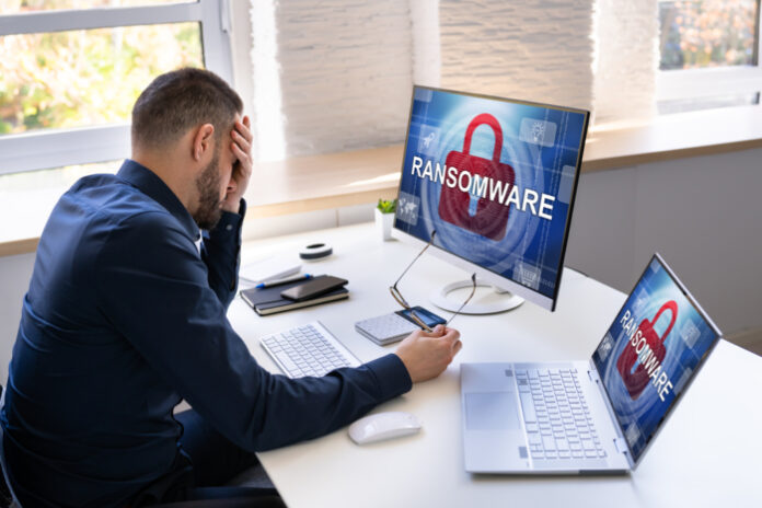 Business Person Upset by Ransomware