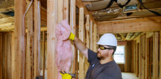 Business Person setting up insulation