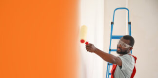 Business Person painting a wall