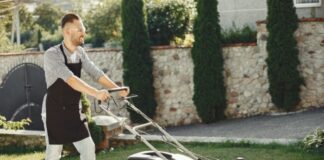 Business Person mowing a lawn