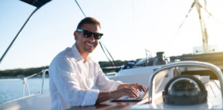 Business Person working remotely from a boat