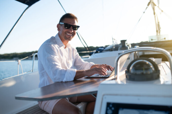 Business Person working remotely from a boat