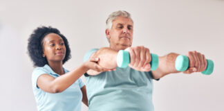 Physical Therapist and Patient