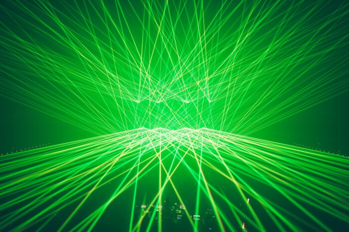 Crisp lasers fill the venue at The Armory in Minneapolis. Photo credit;: Brez Media