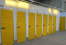 Row of storage units with yellow doors