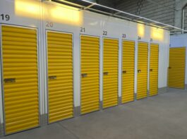 Row of storage units with yellow doors