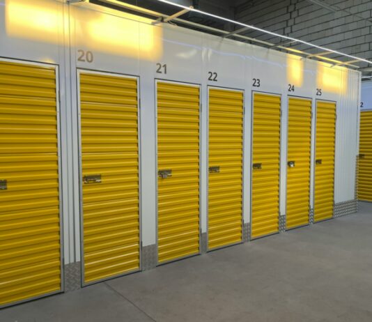 Row of storage units with yellow doors