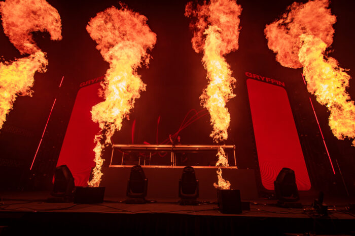 The crisp pyro lights up the stage and heats up the crowd. Photo Credit: Brez Media