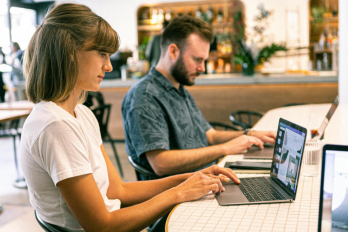 Photo Of Woman Using Laptop - iGaming