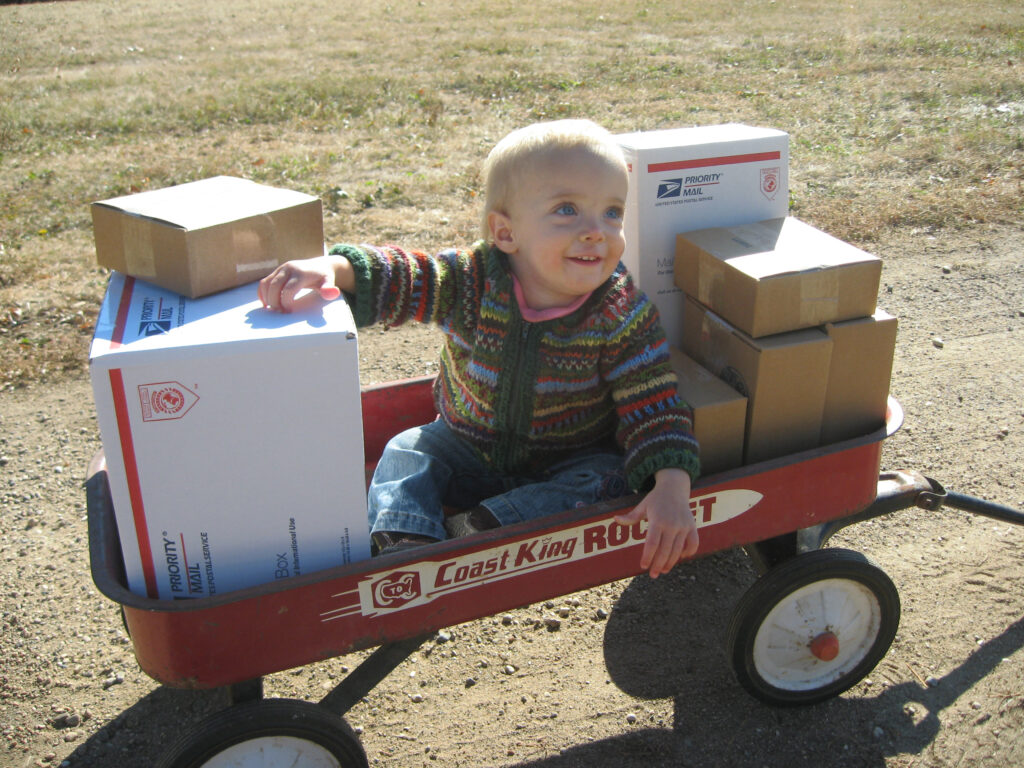 Shipping Smiling Tree Toys packages in the early years - Three Key Hires