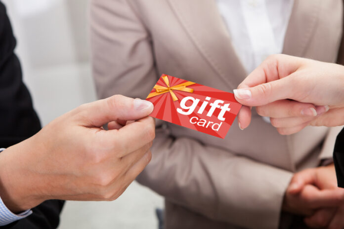 dreamstime_s_58556922 People Choose to Trade Gift Cards
