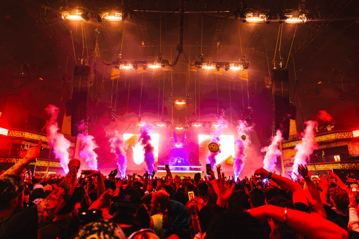 Lights shining around a music venue.