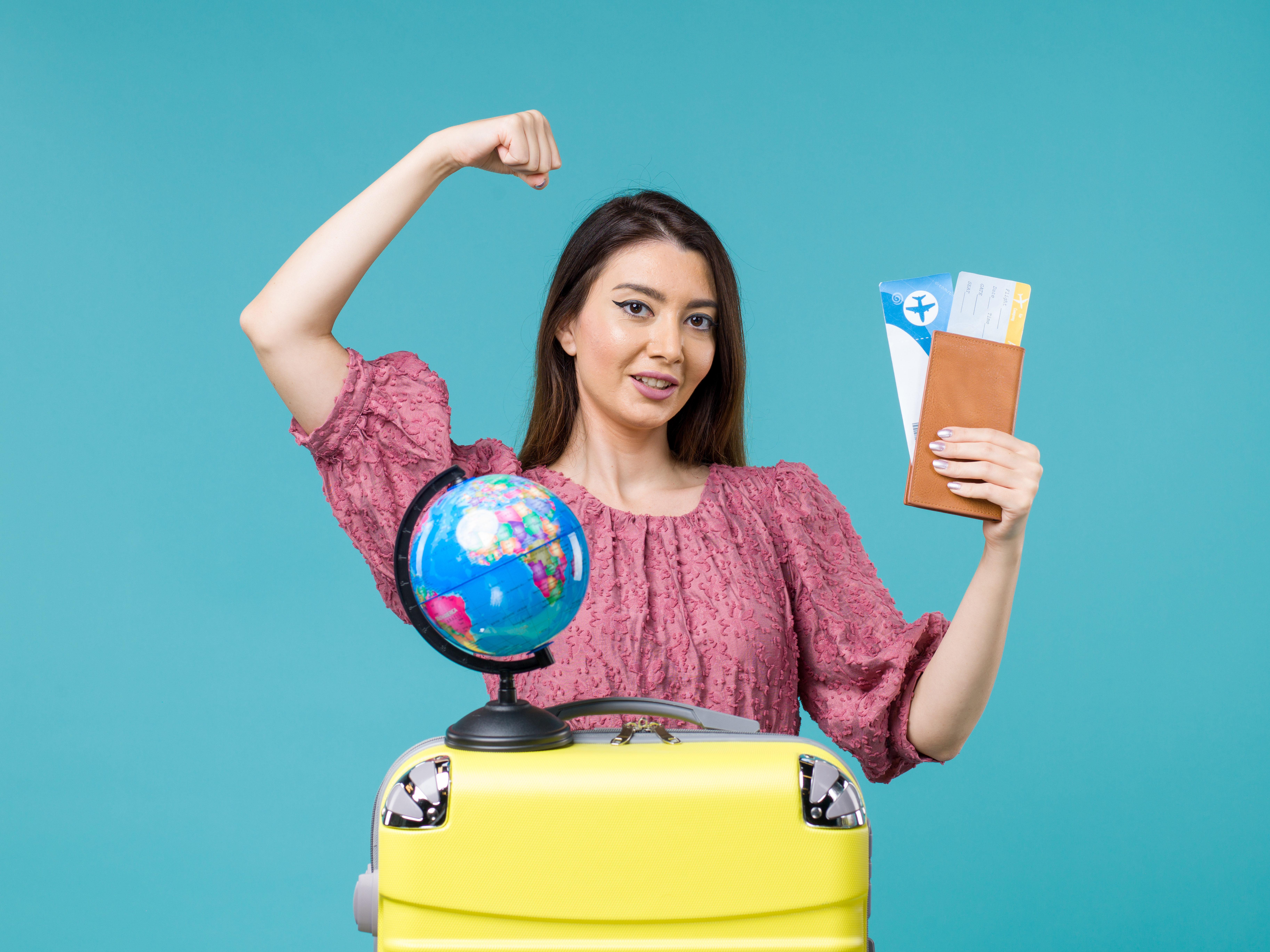 front-view-female-vacation-holding-plane-tickets-blue-background-sea-trip-vacation-woman-voyage-journey easiest-countries-to get- citizenship