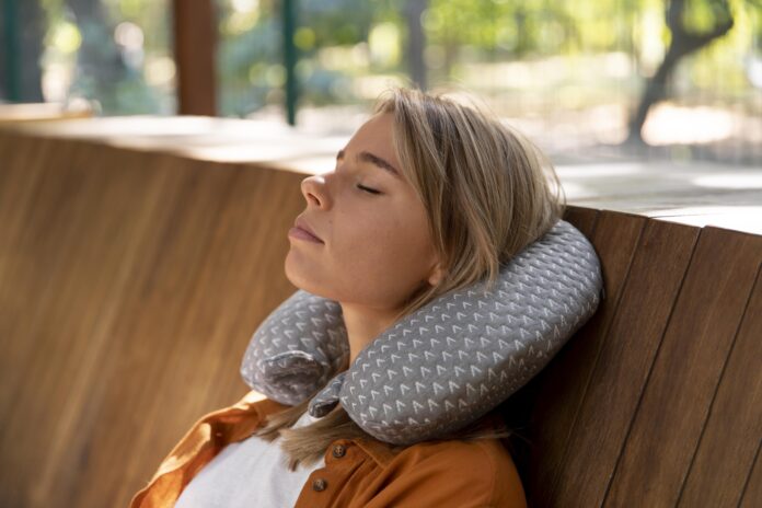 sleeping-person-getting-nap pillow-for-neck- and- shoulder-pain