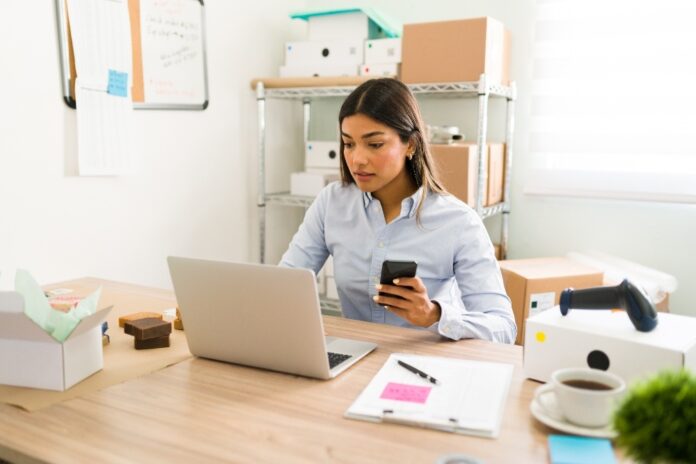 hispanic-young-woman-her-office-looking-her-laptop-smartphone-check-customers-orders-her-online-beauty-shop Overlooked Part of Running an Online Business