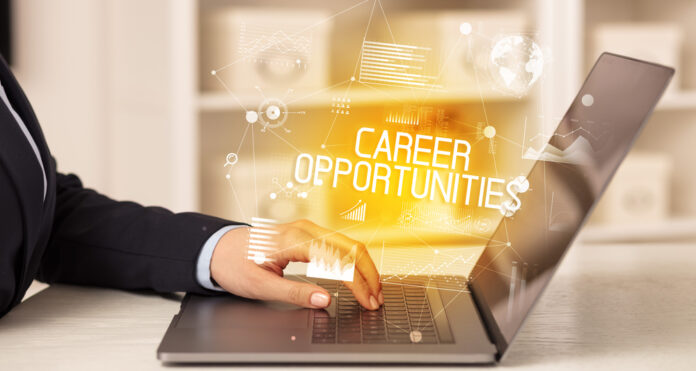 Side view of a business person working on laptop Finding Opportunity in crew management