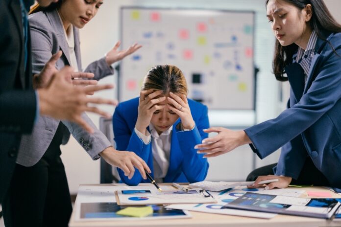 businesswoman-is-feeling-overwhelmed-and-stressed-2026-03-17-14-47-42-utc Feel Less Stressed About Work