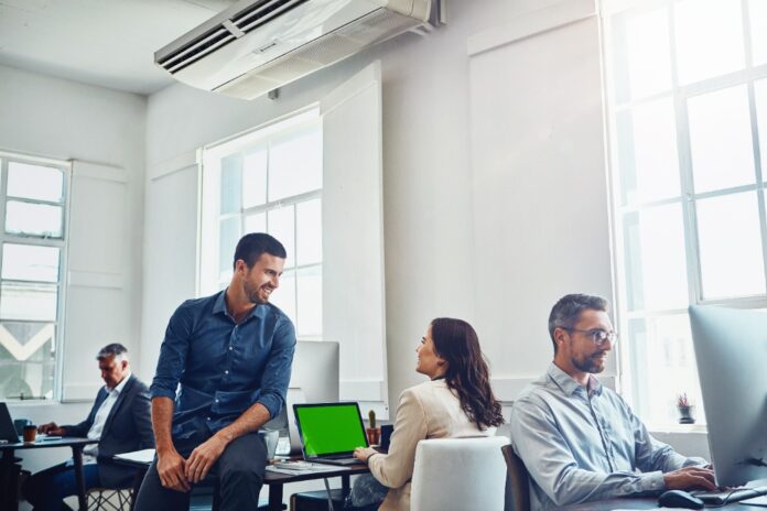 business-colleagues-working-together-in-modern-off-2026-01-09-10-07-54-utc-1000x667 How Temperature and Humidity Affect Office Productivity