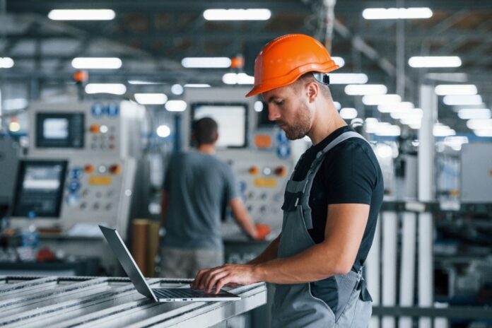 typing-on-keyboard-industrial-worker-indoors-in-f-2026-01-09-00-03-15-utc Digital Marketing for Manufacturing