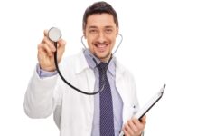 Small business owner comparing health insurance plans