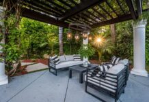 Turning Unused Outdoor Space Into a Home Business Advantage in Tampa Bay Entrepreneur working in an enclosed lanai home office