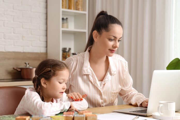 Work-from-home parent with au pair caring for children