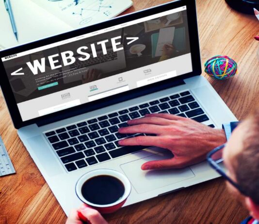 WordPress business website displayed on a desktop computer